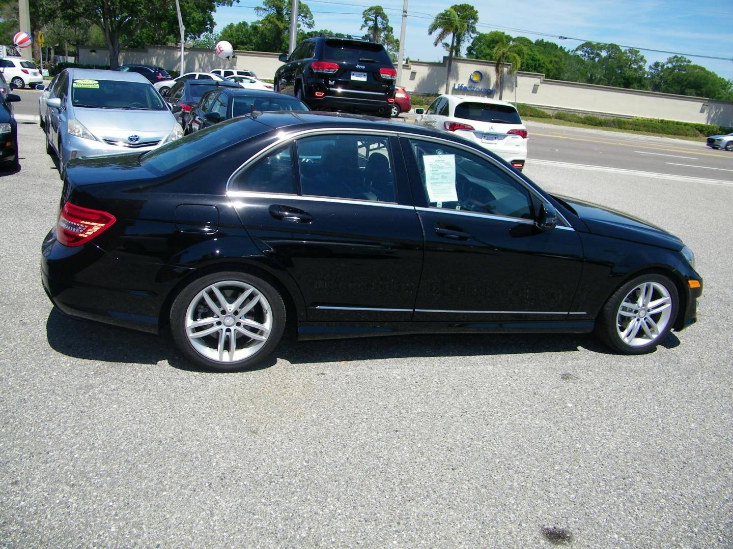 2013 Black /Black Mercedes-Benz C-Class C250 Sport Sedan (WDDGF4HB1DR) with an 3.0L V6 DOHC 16V engine, 7-Speed Automatic transmission, located at 4000 Bee Ridge Road, Sarasota, FL, 34233, (941) 926-0300, 27.298664, -82.489151 - Photo#6